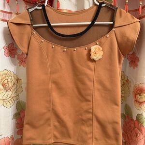 Elegant Tan Women's Top with Floral Accent
